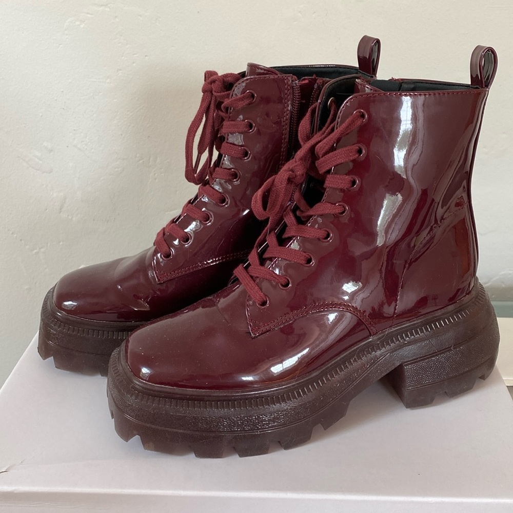 Shiny burgundy Katy Perry square toe combat boots.